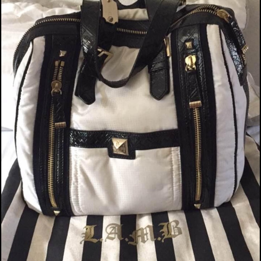 Really cute med sz LAMB bag w/ bag dust cover